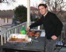 Men's Committee member Harrison Smith grilling at the Super Bowl