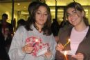 Amanda Diamond and Maddy Knauer prepare to watch the Menorah being lit.