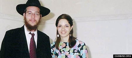 Rabbi Gavriel, left, and Rivkah Holtzberg were killed in one of the worst terrorist attacks in Indian history. Here, they're seen attending to the wedding of a local Jewish couple.