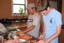 Board member Josh Grob prepares food for falafel night