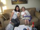 Lani Mendelson of AEPhi gives Challah to a Lambeth resident, who also happens to be an alumna of AEPhi.