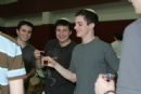 Holding up the Kiddush wine, before dinner