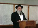 Rabbi Zelig Rivkin, executive director of Chabad Lubavitch of Louisiana, addresses the crowd